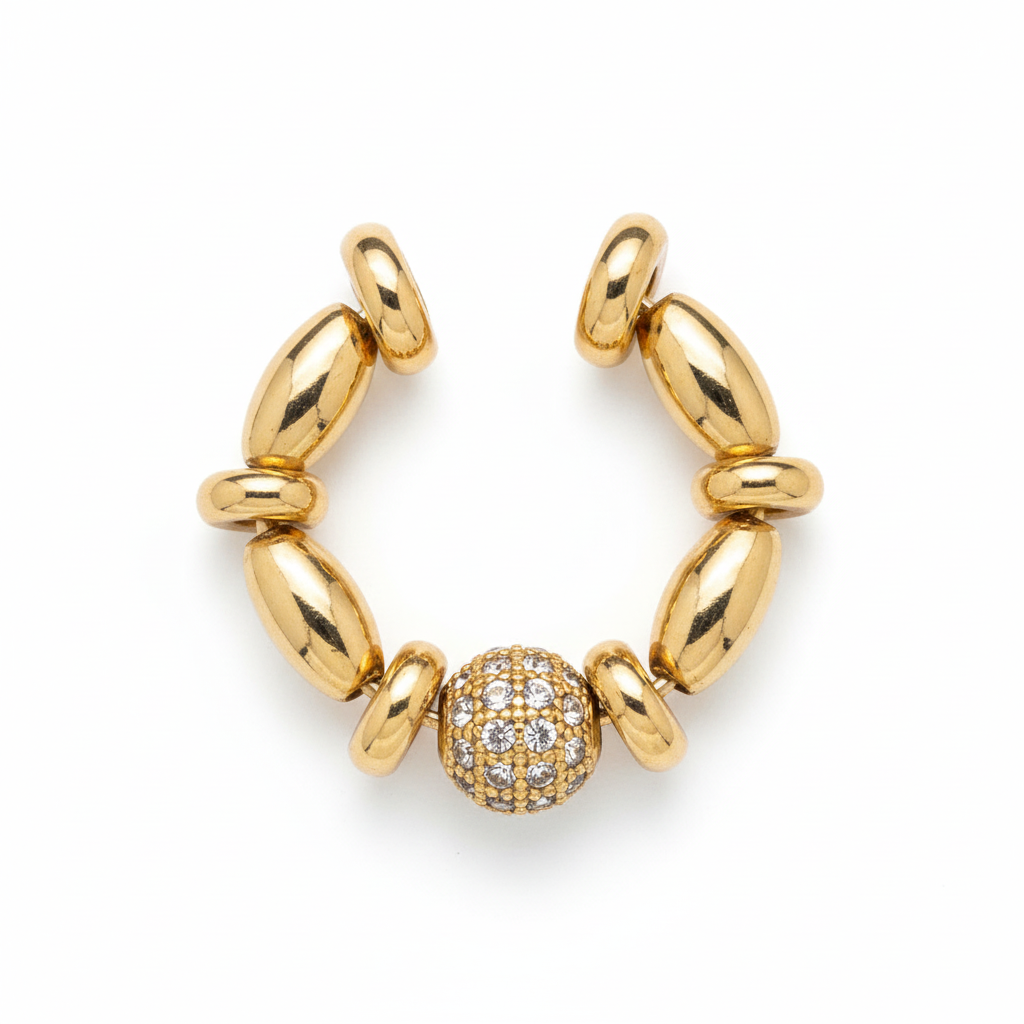 image_8a84f00d-95c7-4f87-a29e-f59f427d50af Gold oval bead and pavé crystal ear cuff on white background