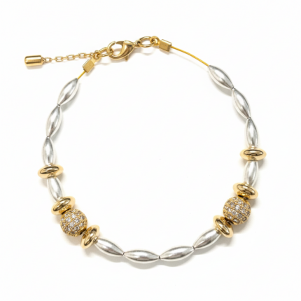 Silver rice pearl and gold pavé ball bracelet with rondelle spacers on white background