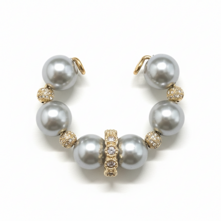 Grey pearl and gold pavé open ear cuff on white background