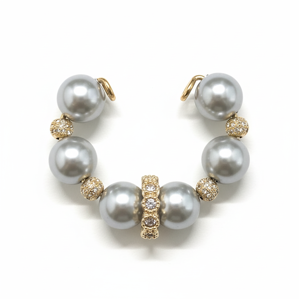 image_90b7b8c9-b73f-480f-8450-cdb8e463a6bc Grey pearl and gold pavé open ear cuff on white background