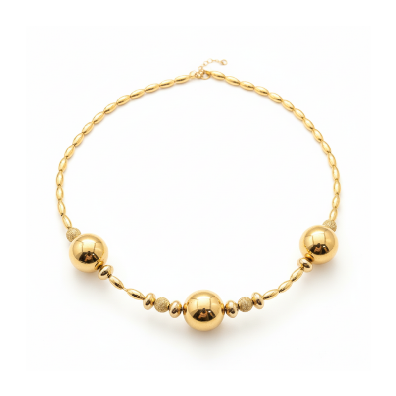 Gold Ball Statement Necklace on white background