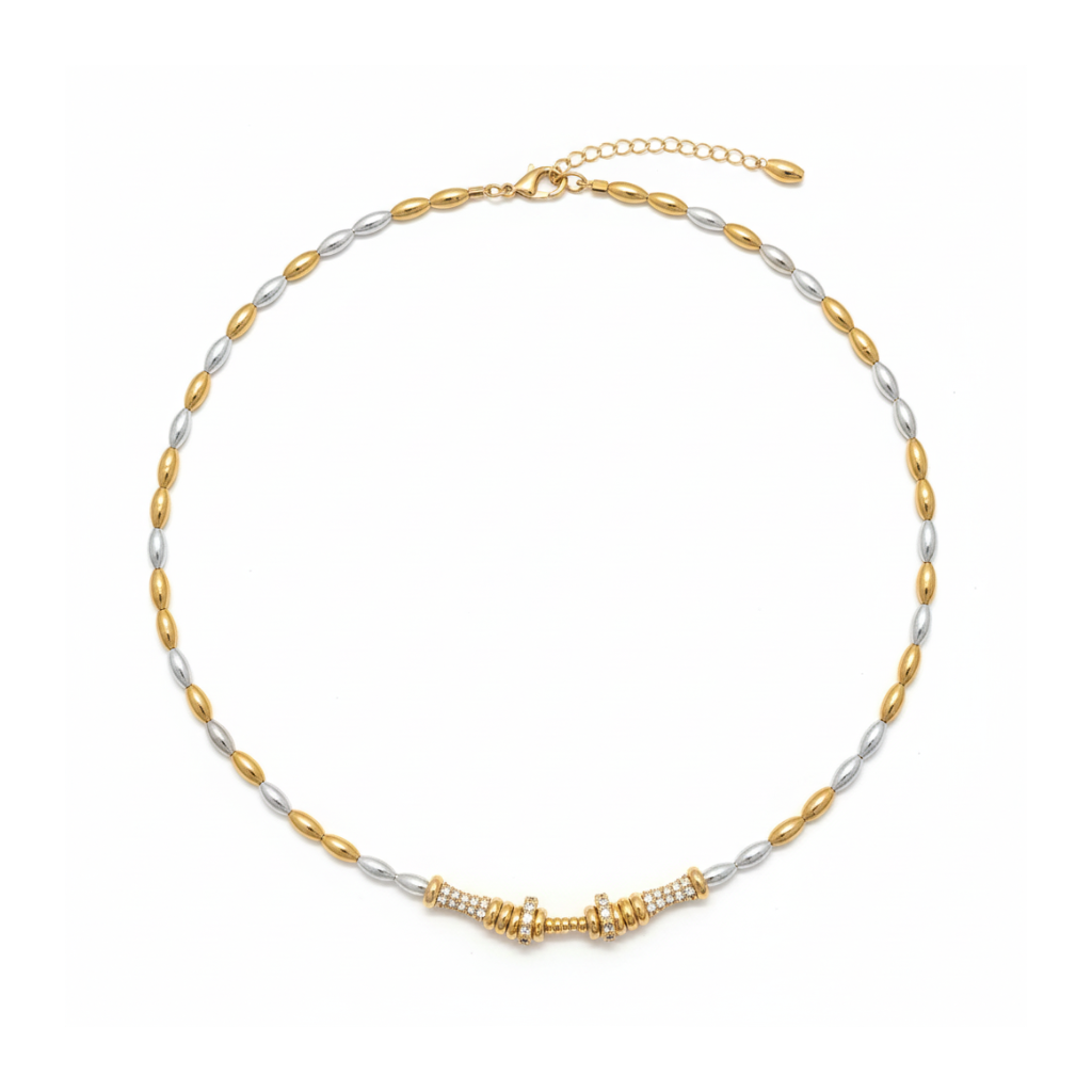 image_db53cb95-3c69-46b5-91af-624c05bf3715 Two-tone silver and gold rice pearl necklace with pavé crystal bar pendant on white background