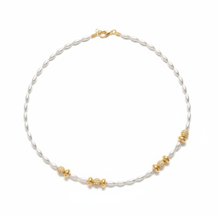 Silver rice pearl and gold pavé beaded necklace on white background